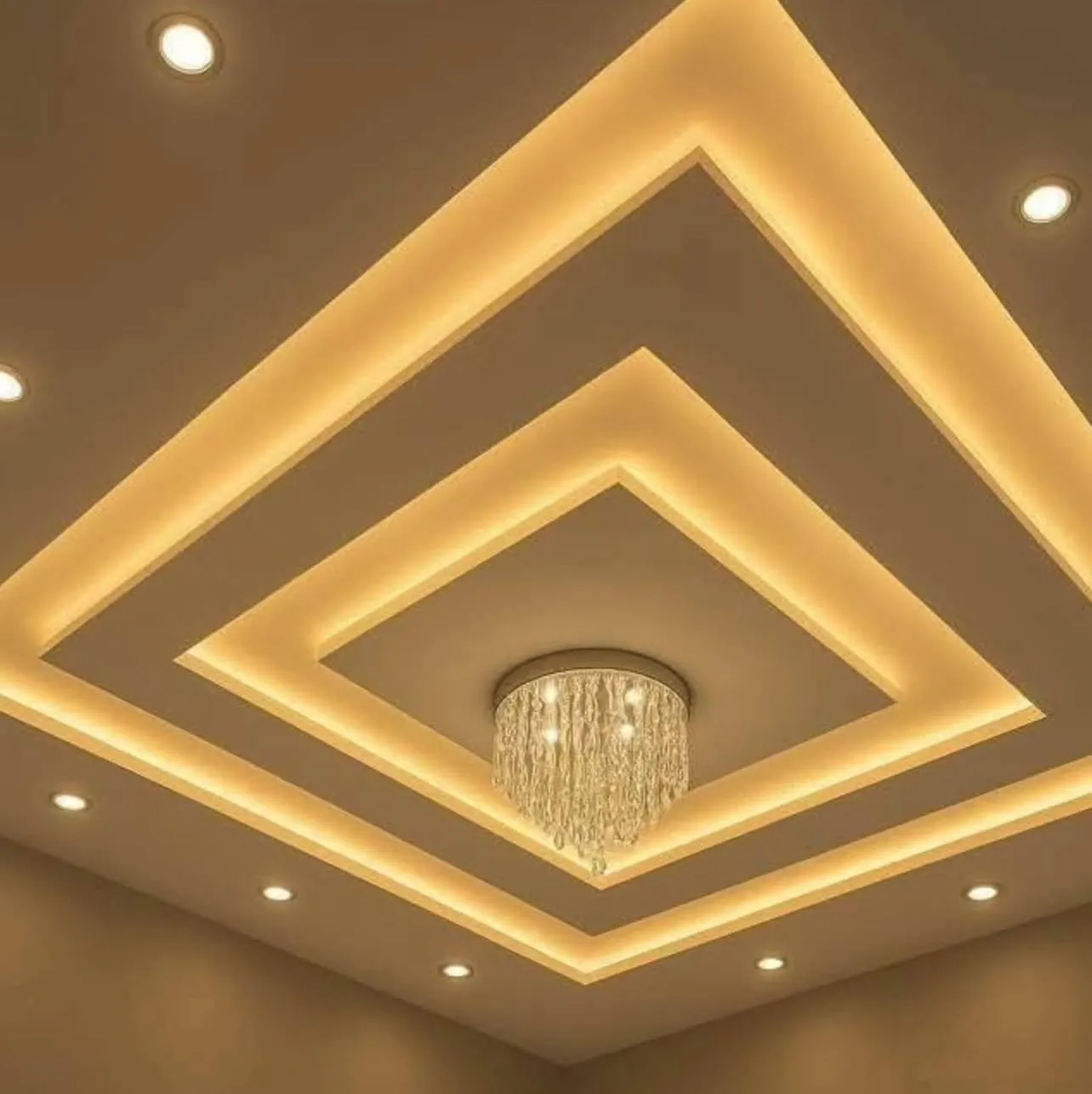 Layered ceiling design with warm LED lighting
