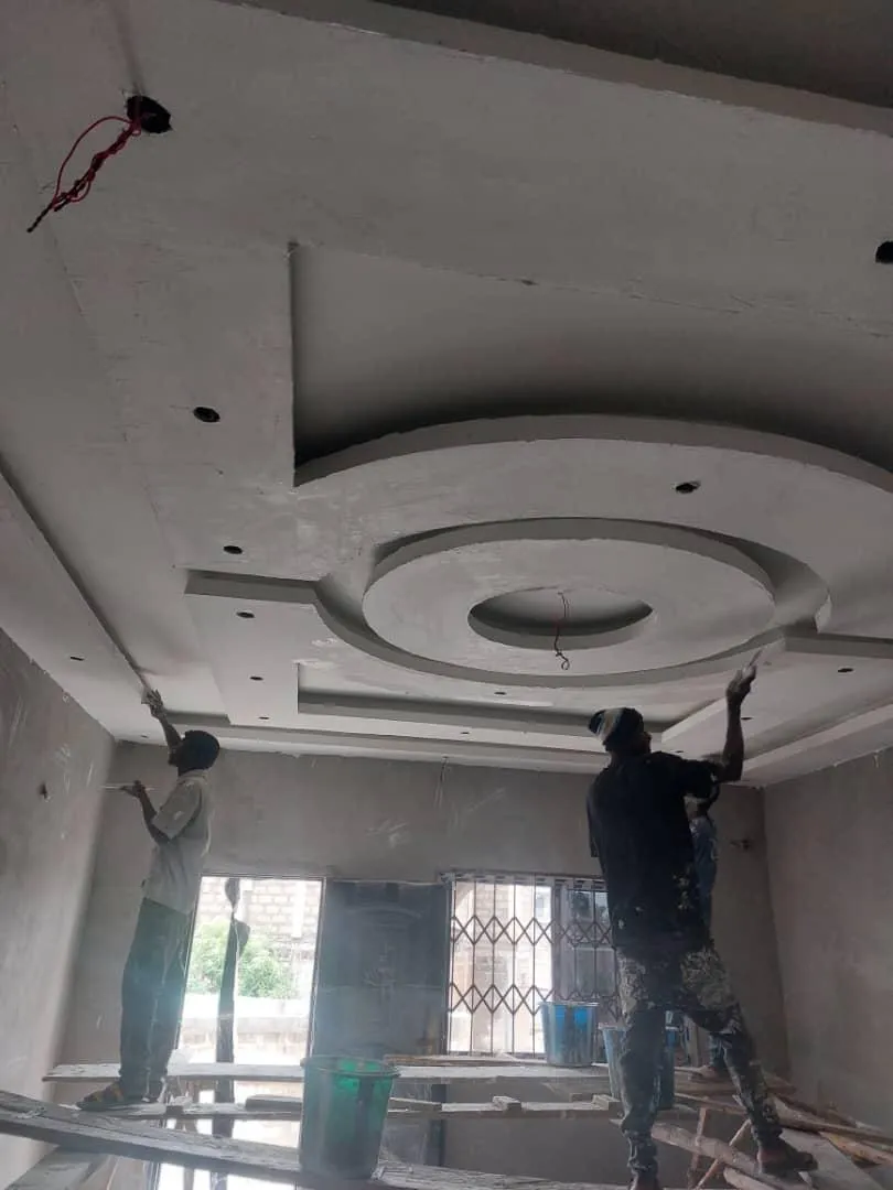 SIMMAS team installing a ceiling